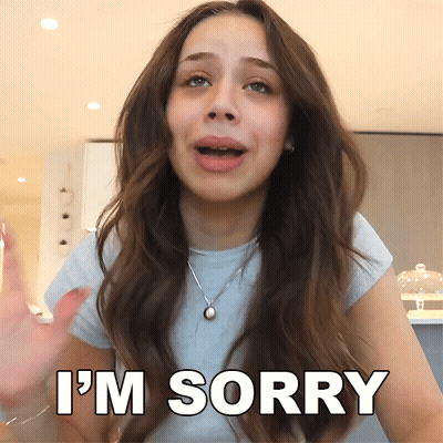 A Girl Says I 'M Sorry In Front Of Her GIF
