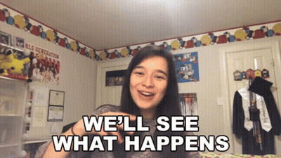 A Girl Says We 'Ll See What Happens In Front Of A Wall With Balloons GIF