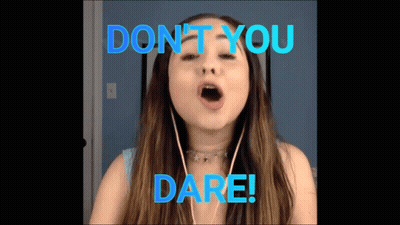 A Girl Singing A Song With The Words Do N't You Dare GIF