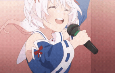 A Girl Singing Into A Microphone With A Bow On Her Chest GIF