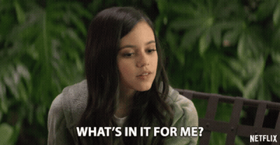 A Girl Sitting On A Bench With A Netflix Logo In The Background GIF
