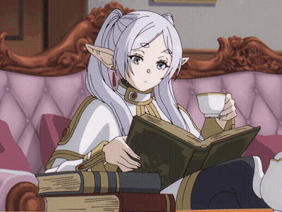 A Girl Sitting On A Couch Reading A Book And Drinking From A Cup GIF