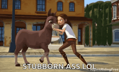 A Girl Standing Next To A Donkey With The Words " Stubborn Ass Lol " Written Below Her GIF
