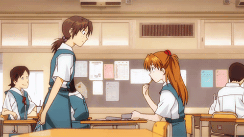 Girl Standing Next To Another Girl In Classroom GIF