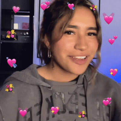 A Girl Wearing A Grey Hoodie With The Number 43 On The Front GIF
