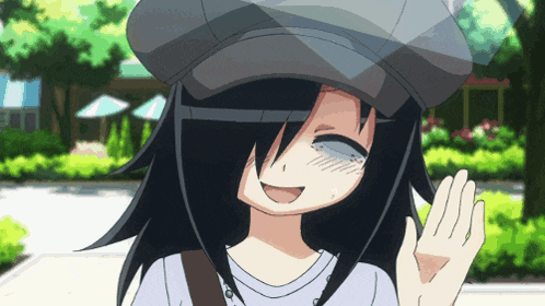 A Girl Wearing A Hat Is Smiling And Waving At The Camera GIF