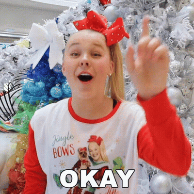 A Girl Wearing A Shirt That Says Jingle Bows Is Giving The Middle Finger GIF