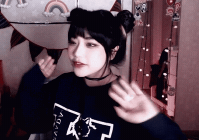A Girl Wearing A Sweatshirt That Says Avdv GIF