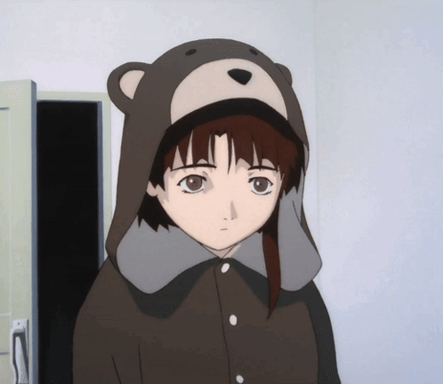 A Girl Wearing A Teddy Bear Hooded Jacket Is Standing In Front Of A Locker GIF