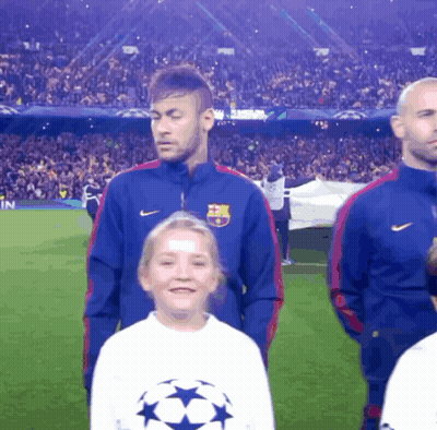 A Girl Wearing A White Shirt With A Soccer Star On It GIF