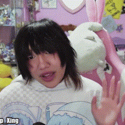 A Girl Wearing A White Shirt With The Word King On The Bottom GIF
