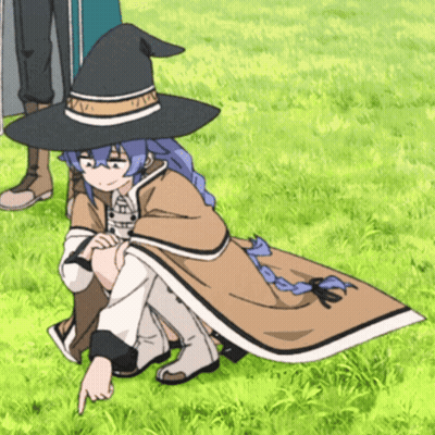 A Girl Wearing A Witch Hat Is Pointing At Something In The Grass GIF