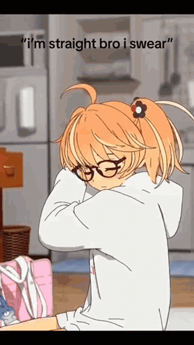 A Girl Wearing Glasses And A Flower In Her Hair Is Standing In A Kitchen . GIF