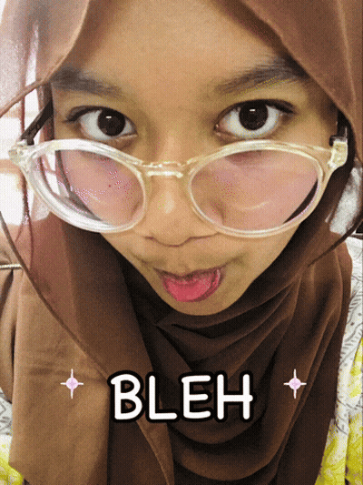 A Girl Wearing Glasses And A Hijab Is Making A Funny Face With The Word Bleh Below Her GIF