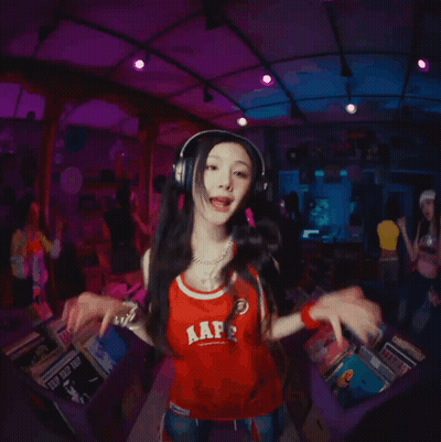 A Girl Wearing Headphones And A Red Shirt That Says Aap On It GIF