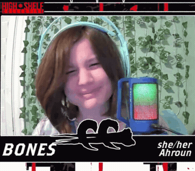 a girl wearing headphones and a sign that says bones on it