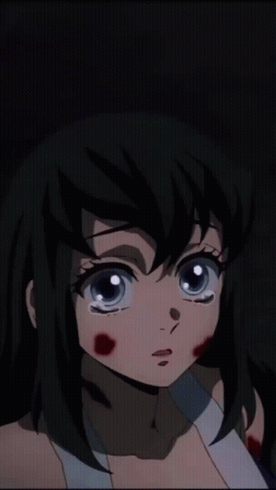 A Girl With A Bandage On Her Arm Is Crying GIF
