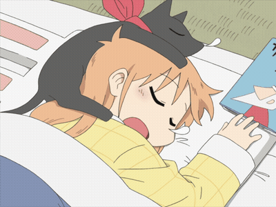 A Girl With A Cat On Her Head Sleeping Next To A Book GIF