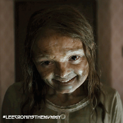 A Girl With A Dirty Face Is Smiling With The Hashtag #Leecroninsthemummy Below Her GIF