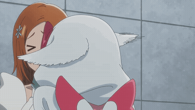 A Girl With A Flower In Her Hair Is Kissing A White Animal GIF