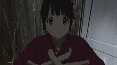 A Girl With A Flower In Her Hair Is Wearing A Kimono GIF