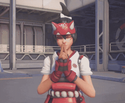 A Girl With A Fox Mask On Her Head Holds Her Hands Together In Prayer GIF