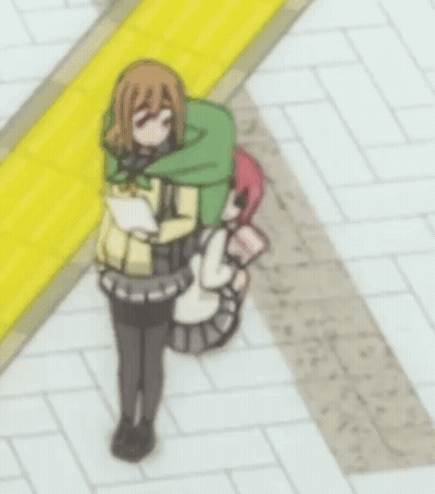 A Girl With A Green Backpack Is Standing Next To Another Girl With Pink Hair GIF