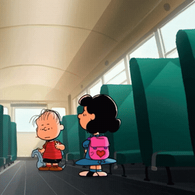 A Girl With A Pink Backpack With A Heart On It Stands Next To A Boy On A Bus GIF