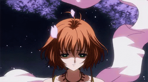 A Girl With A Pink Flower In Her Hair GIF
