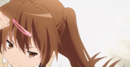 A Girl With A Pink Hair Clip On Her Head GIF