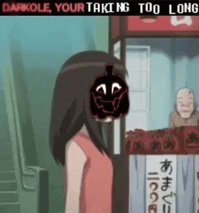 A Girl With A Pumpkin On Her Head Is Standing In Front Of A Kiosk . GIF