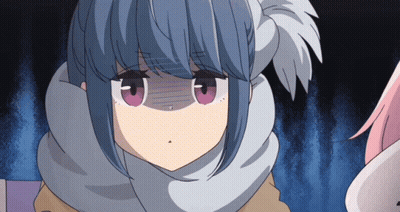 A Girl With A Scarf Around Her Neck Is Making A Silly Face GIF