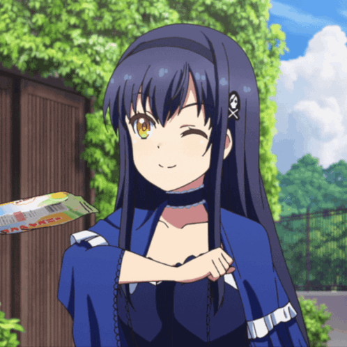A Girl With A Skull And Crossbones Headband Winks At The Camera GIF
