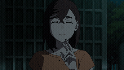A Girl With A Smiley Face On Her Shirt Is Making A Peace Sign GIF