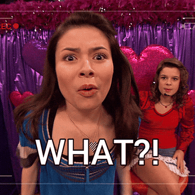 A Girl With A Surprised Look On Her Face And The Word What On The Bottom GIF