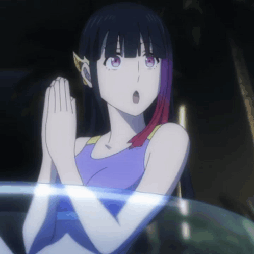 A Girl With A Surprised Look On Her Face Is Wearing A Blue Tank Top GIF