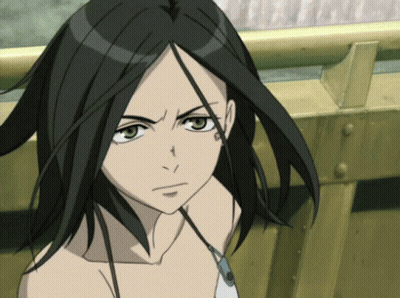 A Girl With Black Hair Has A Tattoo On Her Arm GIF
