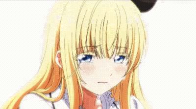 A Girl With Blonde Hair And Blue Eyes Is Crying With Her Eyes Closed GIF