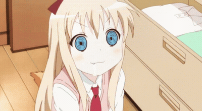 A Girl With Blonde Hair And Blue Eyes Is Sitting Next To A Drawer GIF