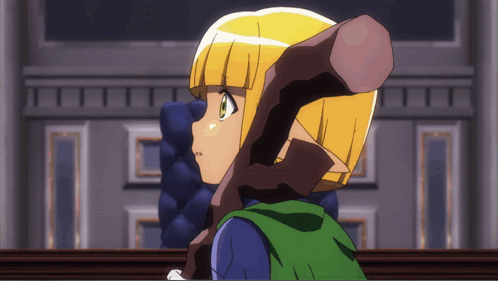 A Girl With Blonde Hair And Green Eyes Is Holding A Stick GIF
