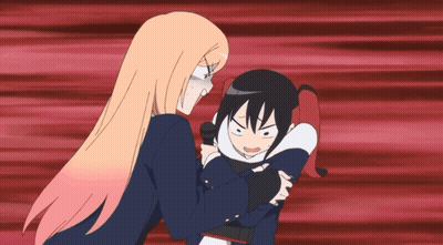 A Girl With Blonde Hair Is Holding A Girl With Black Hair In Her Arms GIF