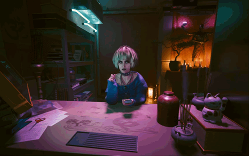 A Girl With Blonde Hair Is Sitting At A Table In A Dark Room With A Purple Light Behind Her GIF