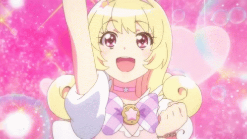 A Girl With Blonde Hair Is Wearing A Choker And A Necklace With A Star On It . GIF