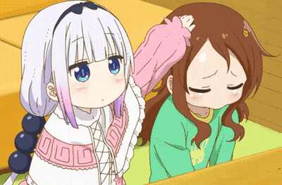 A Girl With Blue Eyes Is Petting Another Girl 'S Head While Another Girl Looks Down GIF