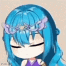 A Girl With Blue Hair And A Flower Crown On Her Head GIF