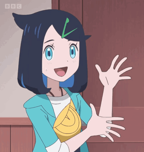 A Girl With Blue Hair And A Green Arrow In Her Hair Is Waving Her Hand In Front Of A Bbc Logo GIF