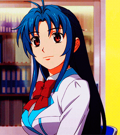 A Girl With Blue Hair And A Red Bow Tie Is Standing In Front Of A Bookshelf GIF