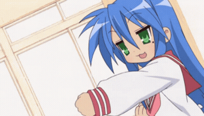 A Girl With Blue Hair And Green Eyes Is Standing In A Room GIF