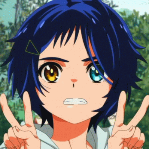 A Girl With Blue Hair And Yellow Eyes Is Giving A Peace Sign GIF