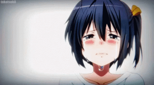 A Girl With Blue Hair Is Crying With Tears Running Down Her Face . GIF